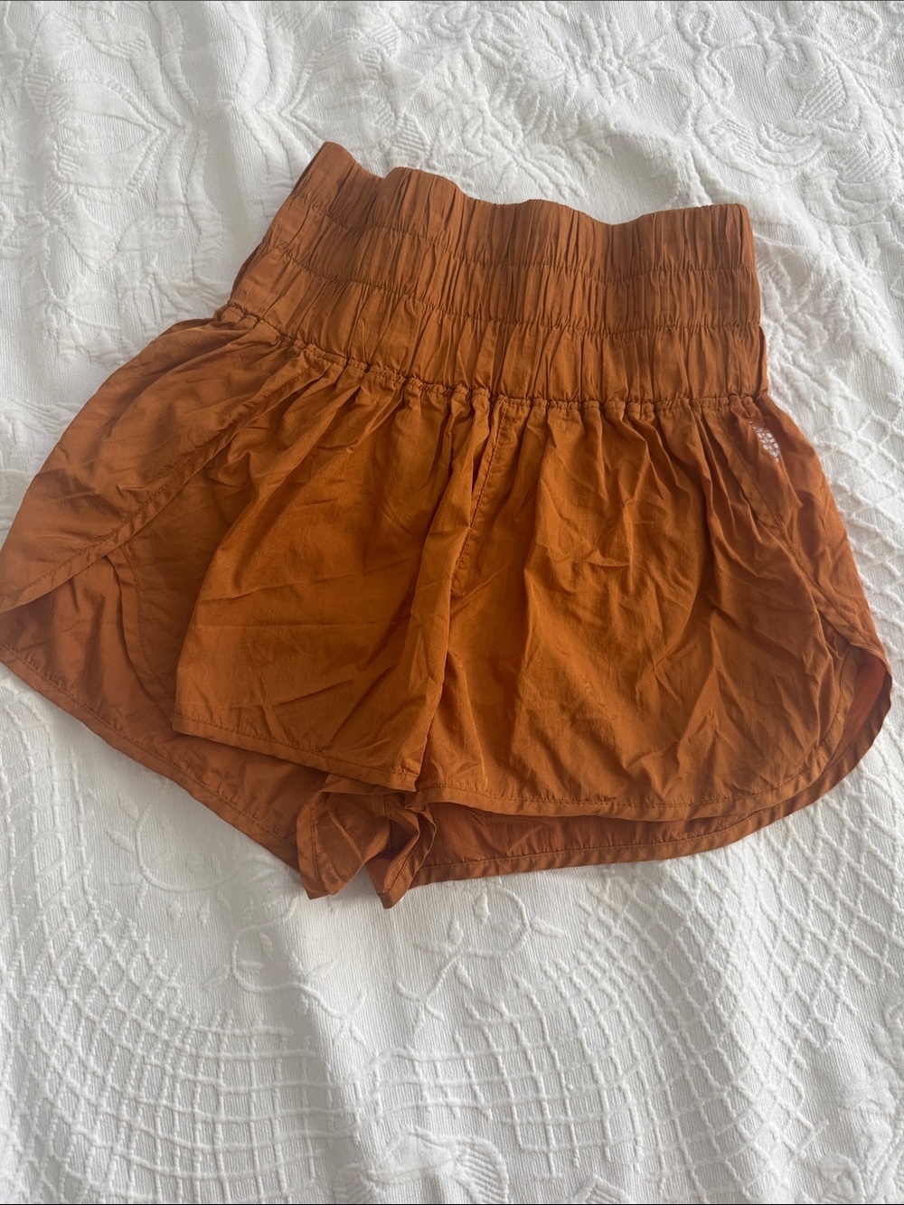 FP Movement by Free People High-Waist Smocked Shorts in Rust